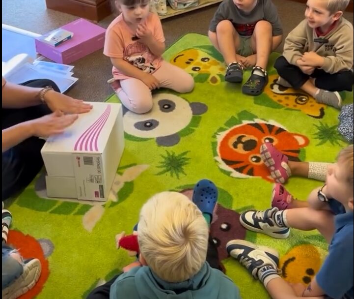 Our First Phonics Session of the New School Year! Children playing on a mat